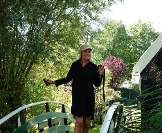 Maaike your local tourguide  wearing Dutch wooden shoes. Windmill, Tulips, Cheese, Zaanse Schans, Keukenhof, Volendam, Marken, Alkmaar.