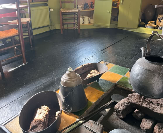 Maaike your local tourguide  wearing Dutch wooden shoes. Windmill, Tulips, Cheese, Zaanse Schans, Keukenhof, Volendam, Marken, Alkmaar.