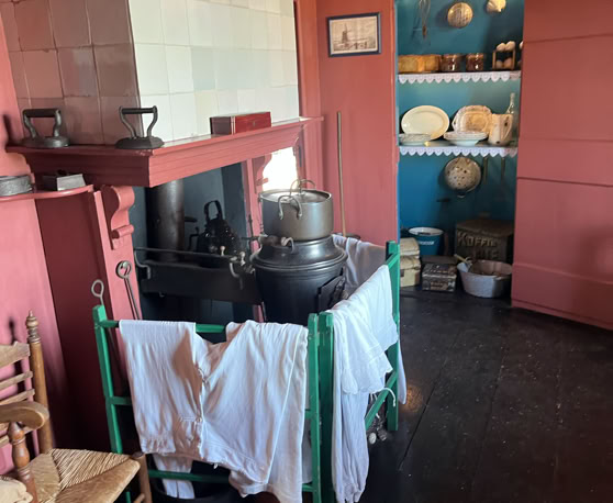 Maaike your local tourguide  wearing Dutch wooden shoes. Windmill, Tulips, Cheese, Zaanse Schans, Keukenhof, Volendam, Marken, Alkmaar.