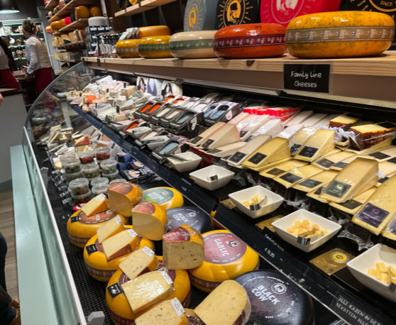 Maaike your local tourguide  wearing Dutch wooden shoes. Windmill, Tulips, Cheese, Zaanse Schans, Keukenhof, Volendam, Marken, Alkmaar.
