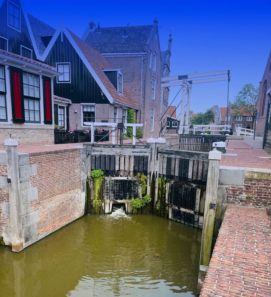 Maaike your local tourguide  wearing Dutch wooden shoes. Windmill, Tulips, Cheese, Zaanse Schans, Keukenhof, Volendam, Marken, Alkmaar.