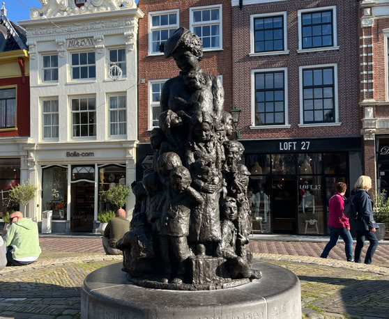 Maaike your local tourguide  wearing Dutch wooden shoes. Windmill, Tulips, Cheese, Zaanse Schans, Keukenhof, Volendam, Marken, Alkmaar.