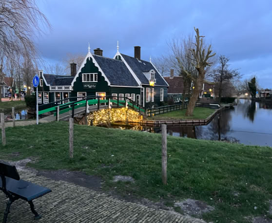 Maaike your local tourguide  wearing Dutch wooden shoes. Windmill, Tulips, Cheese, Zaanse Schans, Keukenhof, Volendam, Marken, Alkmaar.