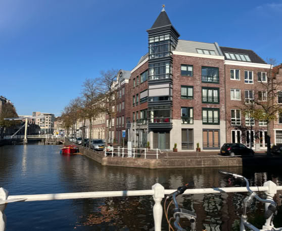 Maaike your local tourguide  wearing Dutch wooden shoes. Windmill, Tulips, Cheese, Zaanse Schans, Keukenhof, Volendam, Marken, Alkmaar.